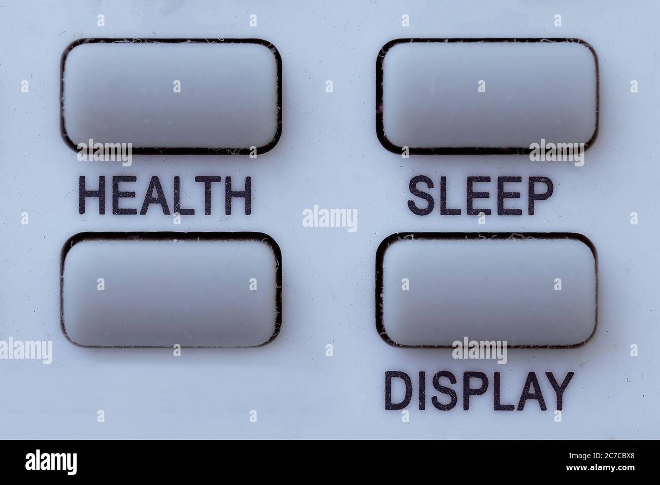 Buttons on a white background with inscriptions Health, Sleep. Isolated photo. Stock Photo