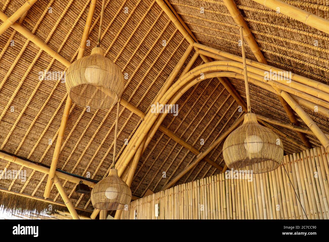 Traditional style chandelier. made from rattan wood. Ecological house ...