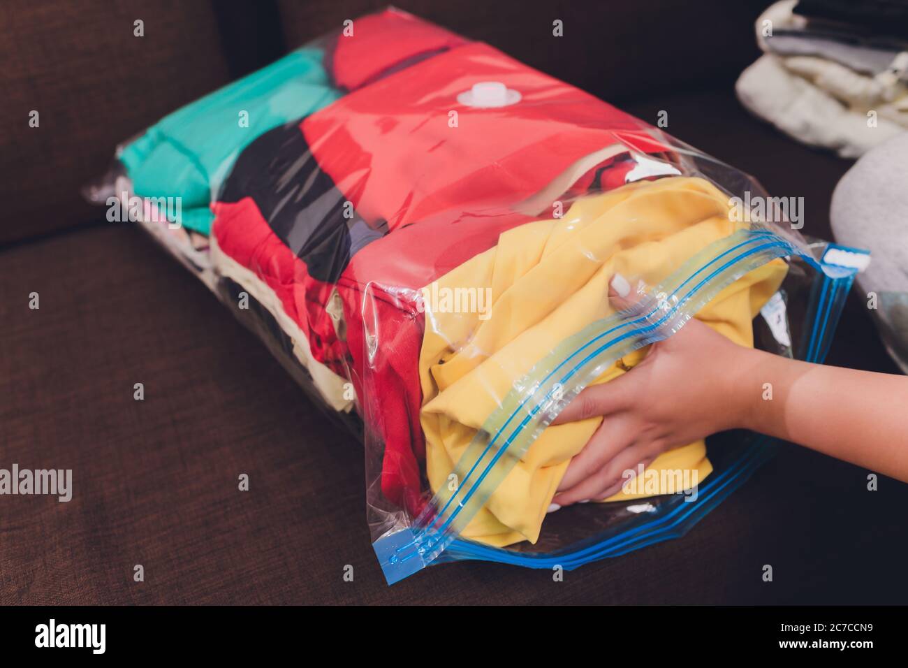 Space saver saving seal bag sucking air out , vacuum clothing storage