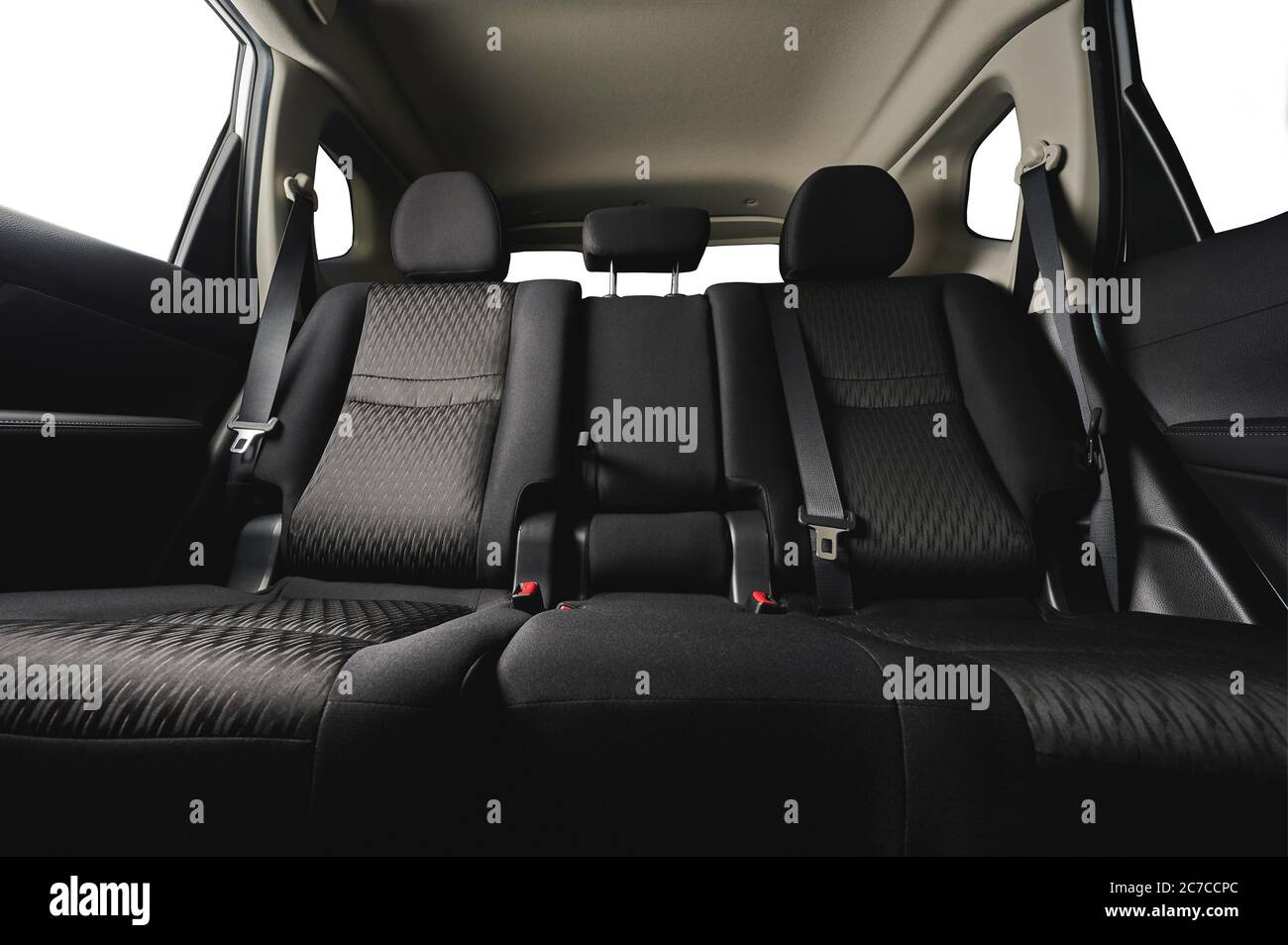 Clean car back seat low angle view with isolated windows Stock Photo