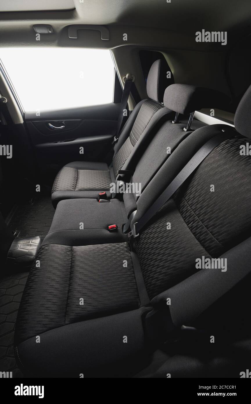 Clean black material car back seat side view Stock Photo