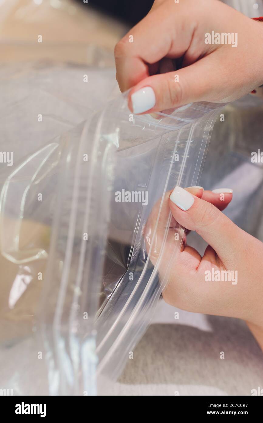 Space saver saving seal bag sucking air out , vacuum clothing storage