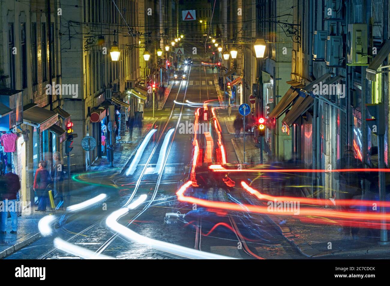 Long exposure shot of light trails going through the centre of Lisbon, Portugal Stock Photo