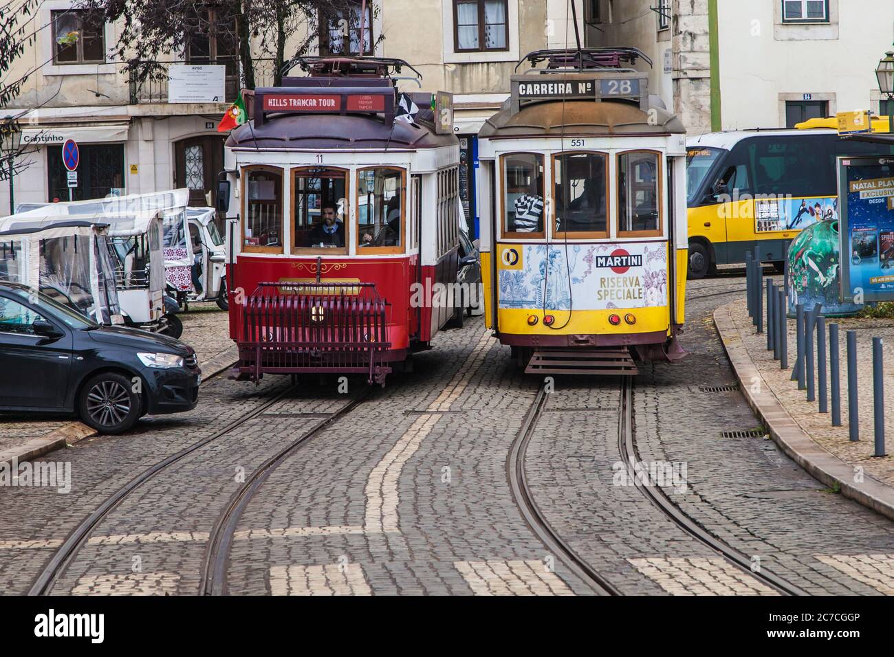 Lisbon, Portugal - December 20, 2019: Trams at Largo das Portas do Sol, Lisbon, Portugal. Stock Photo