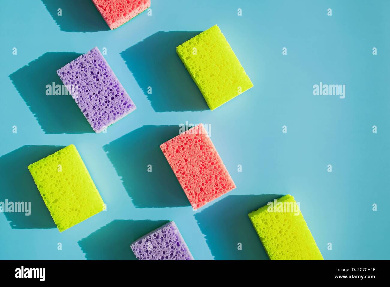Cleaning sponges for washing dishes on blue background i Stock Photo