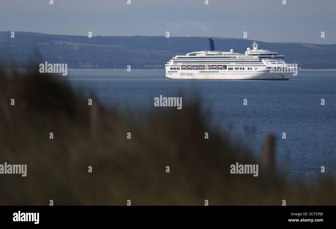 The P&O Cruise ship Aurora in Poole Bay, Dorset, as the cruise industry remains in lockdown due to the coronavirus pandemic. Stock Photo