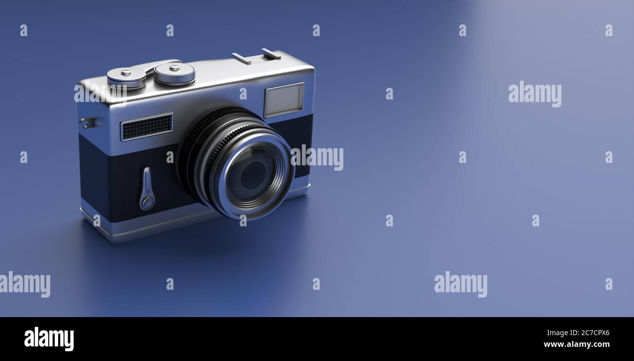 Photo camera vintage style. Retro old fashioned camera isolated on blue