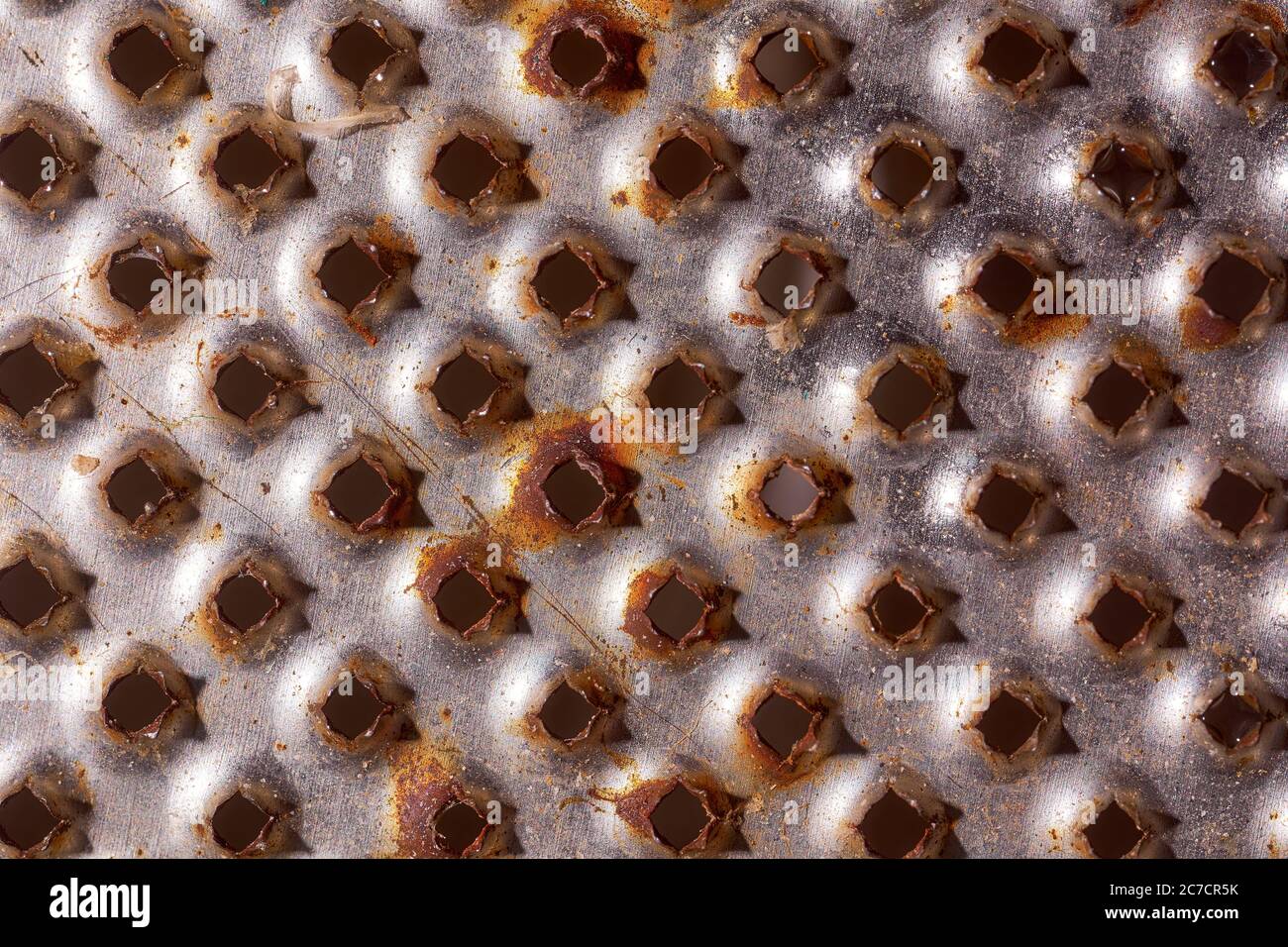 Iron's background rusty grater. Close-up. Macro effect photo Stock Photo