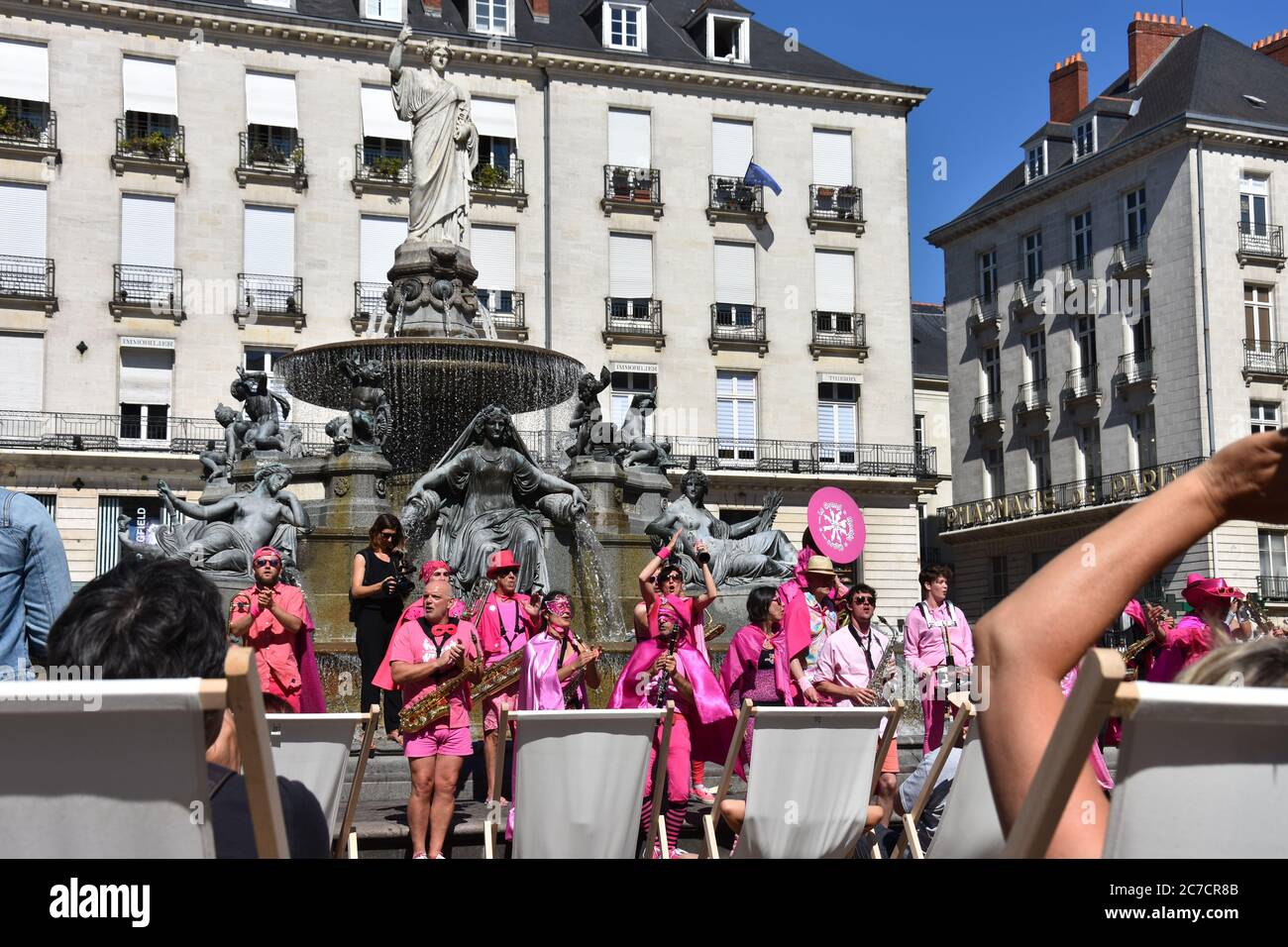 People playing instruments in the central square of Nantes, France Stock Photo