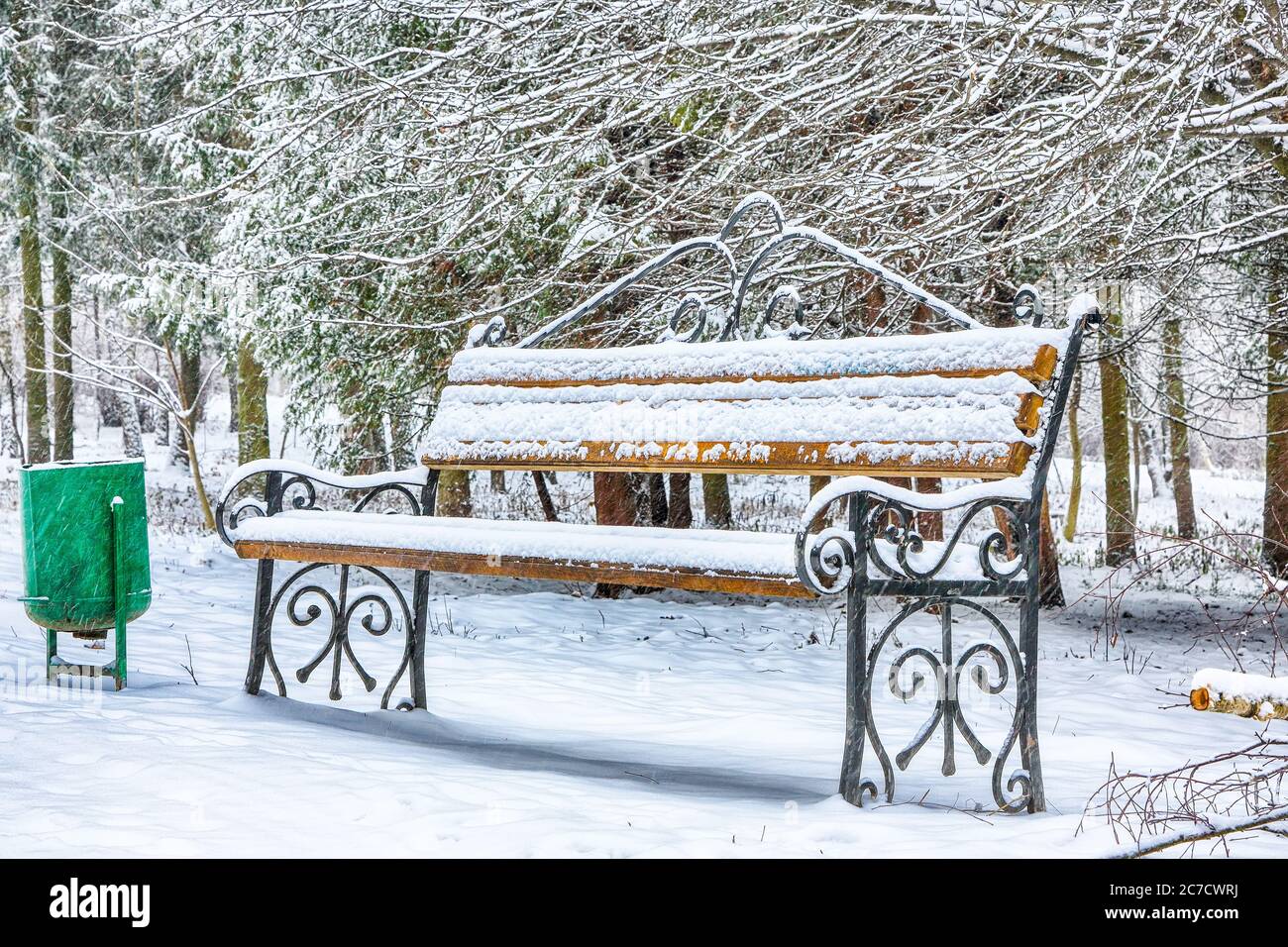 Park bench and trees covered by heavy snow. Lots of snow Stock Photo ...