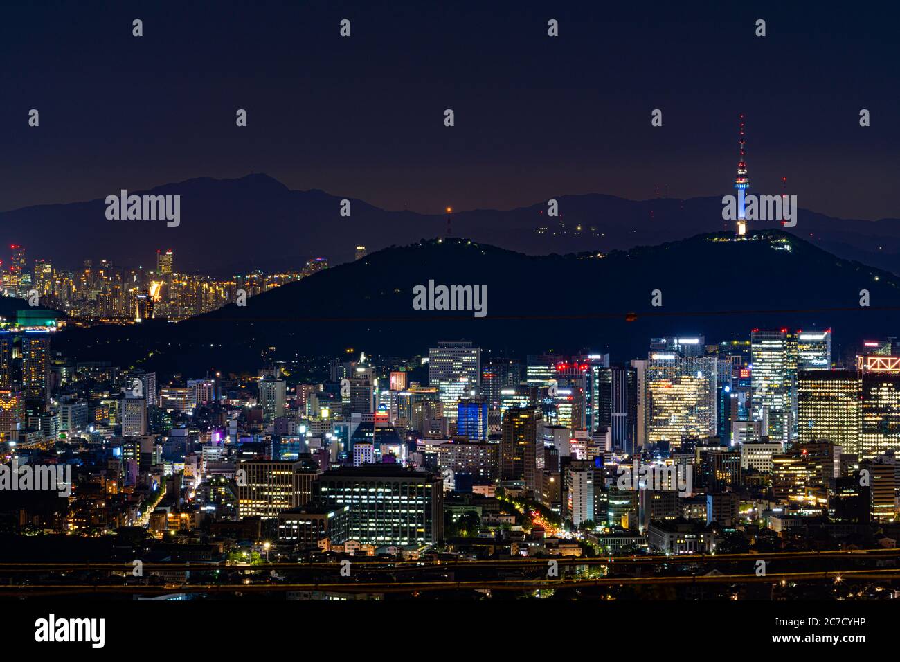 Seoul night scene with Namsan seen from Bukak Skyway Octagonal Pavilion in South Korea Stock Photo
