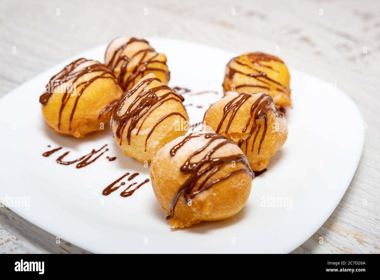 Small dessert donuts with chocolate frosting Stock Photo