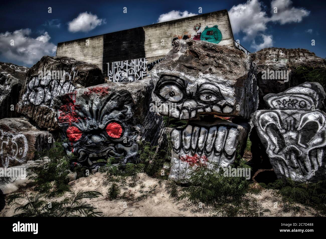 Graffiti. Colourful art. Painted rocks and boulders Stock Photo Alamy