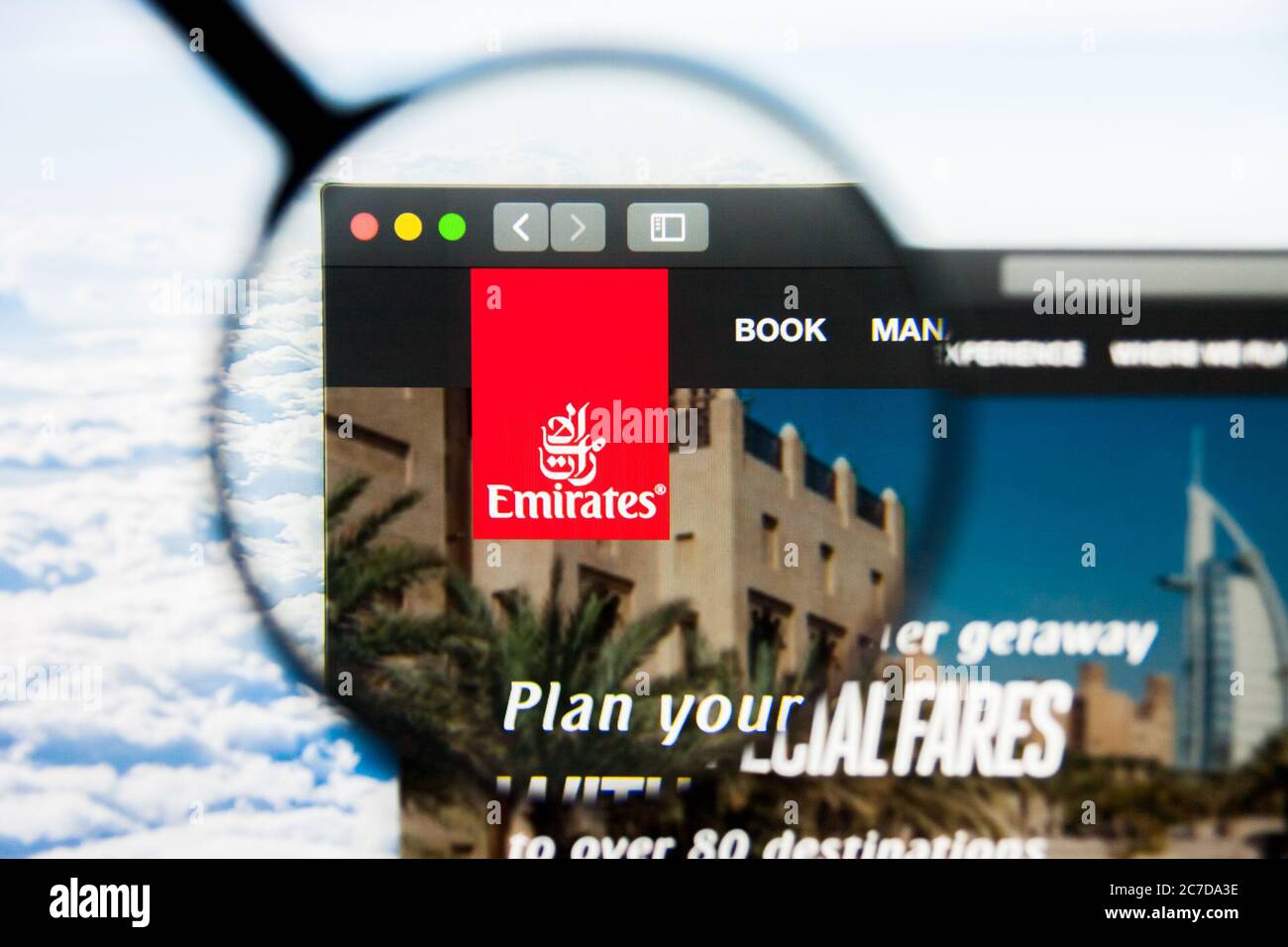 Los Angeles, California, USA - 21 March 2019: Illustrative Editorial of Emirates website homepage. Emirates logo visible on display screen. Stock Photo