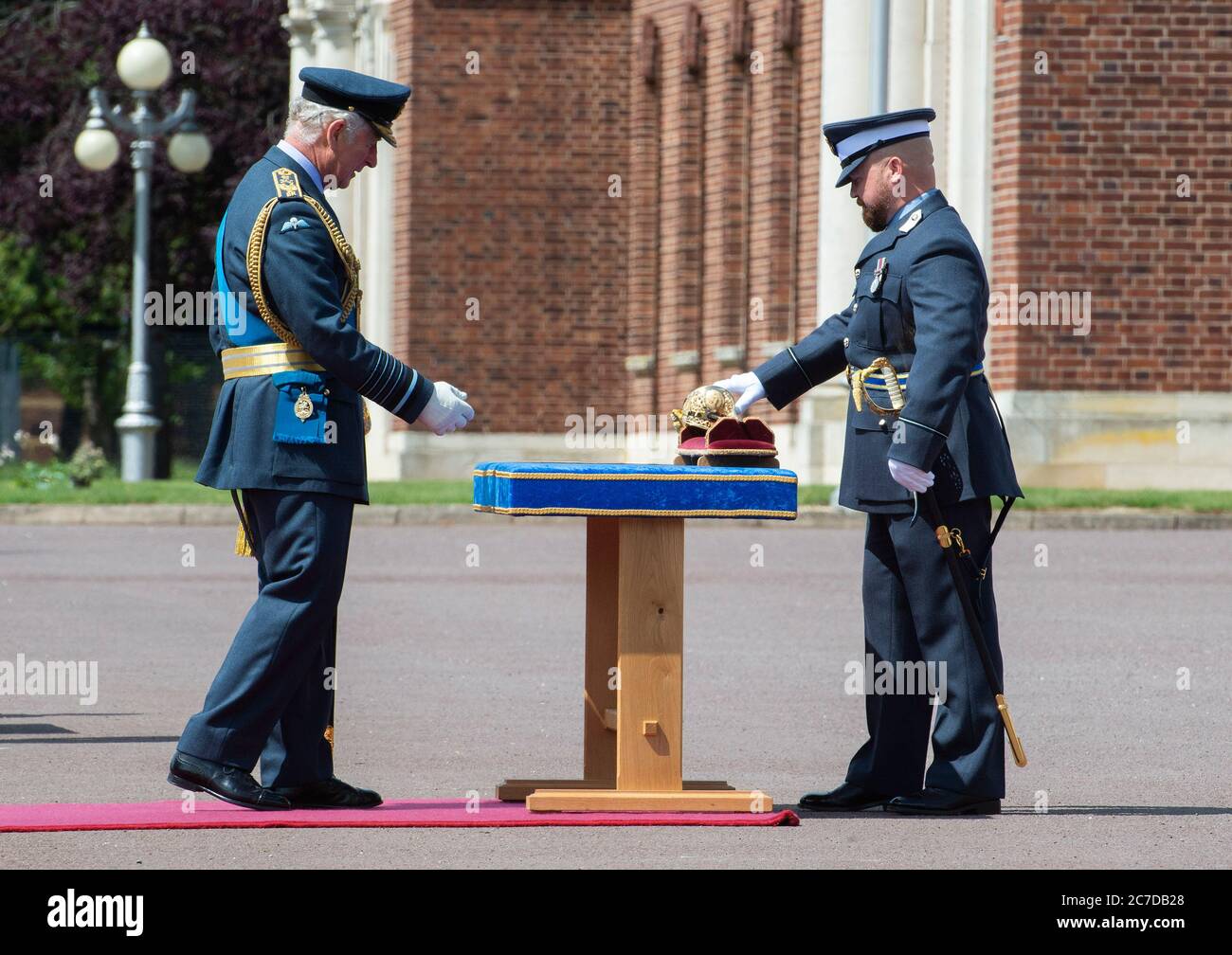 Flying Officer Eliot Bishop receives The Sword of Honour from the ...