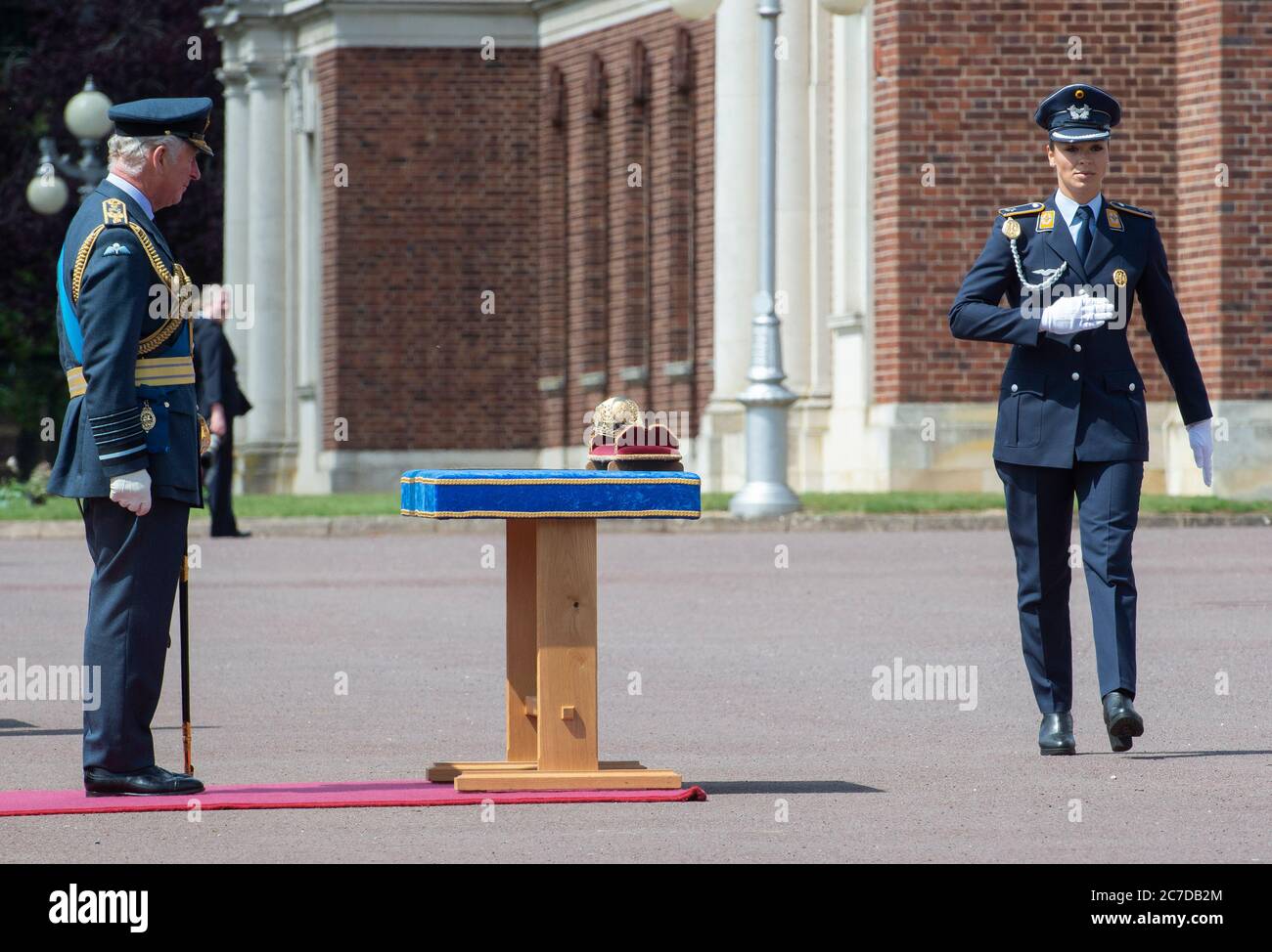 German graduate Nicole Nordholtz receiving the International Award from the Prince of Wales during the Graduation Ceremony of the Queen's Squadron at RAF College Cranwell, Lincolnshire. Stock Photo