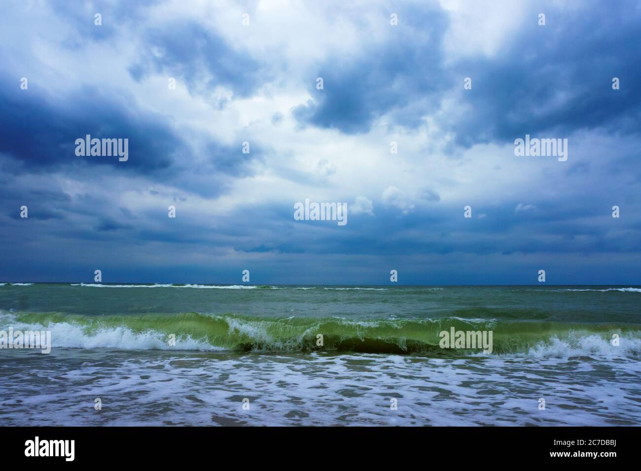 big waves and clouds, storm at sea Stock Photo - Alamy