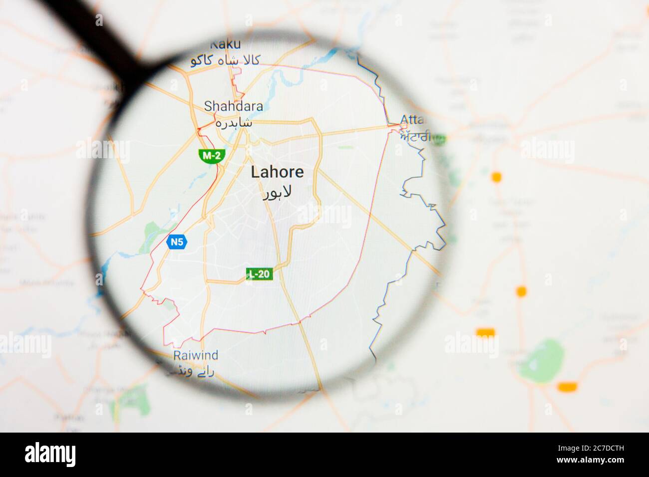 Lahore, Pakistan city visualization illustrative concept on display screen through magnifying glass Stock Photo