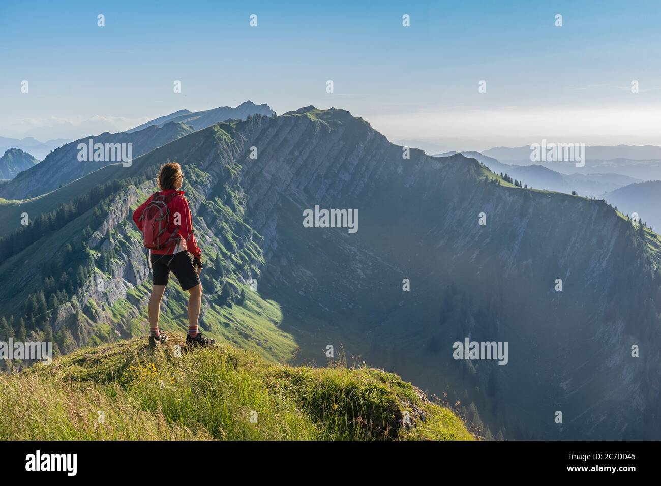 allgaeu alps, mountains, hiking, senior woman, walking, solitude, joyful, mountain running, enjoying life, running, vorarlberg, copy space, background Stock Photo