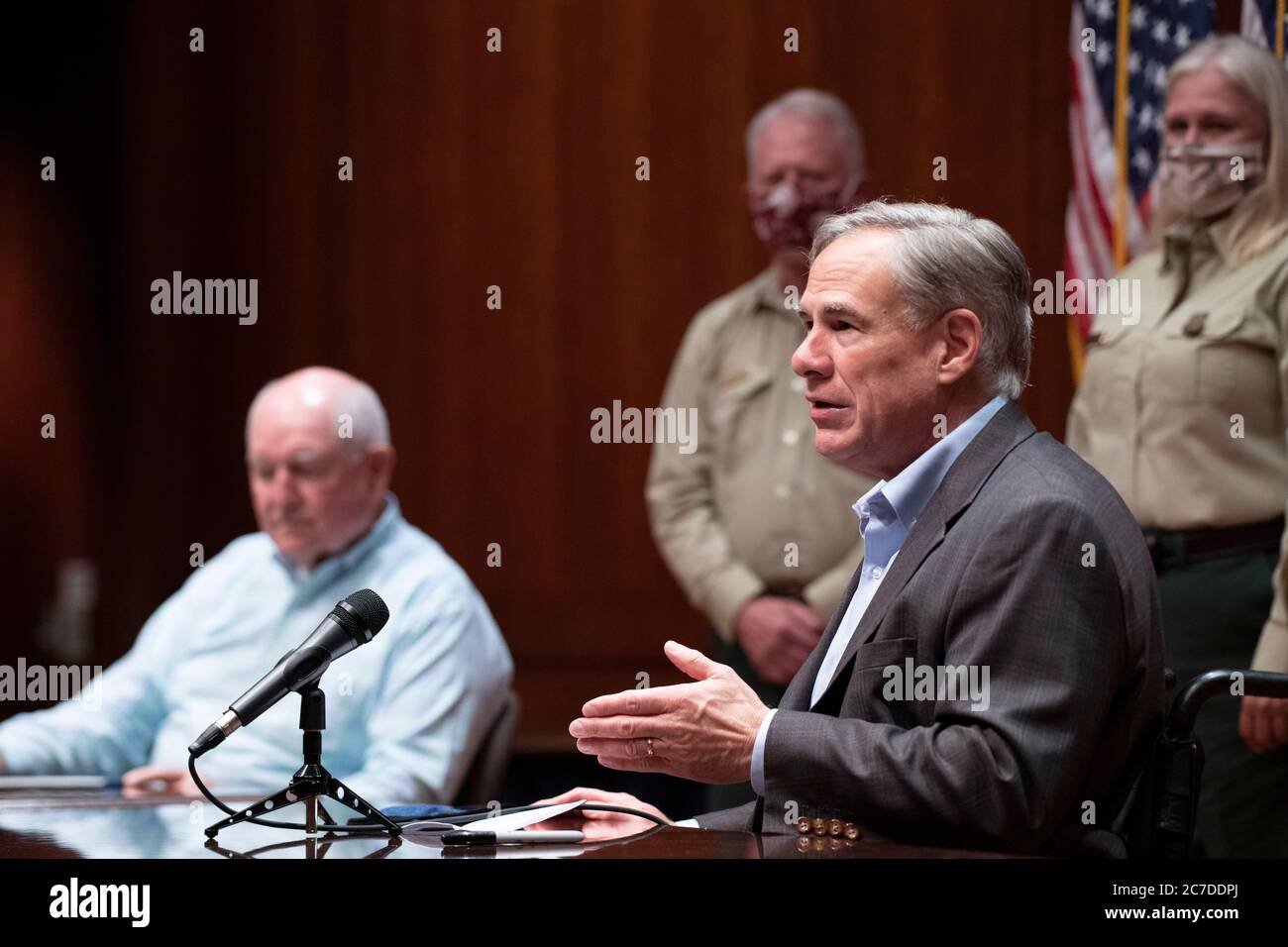 Austin Texas USA July 16, 2020: Governor Greg Abbott briefs the press with a face mask during a press conference with U.S. Secretary of Agriculture Sonny Perdue at the Texas Capitol. Abbott reviewed the state's response to growing pandemic case numbers and rising deaths in Texas. Credit: Bob Daemmrich/Alamy Live News Stock Photo