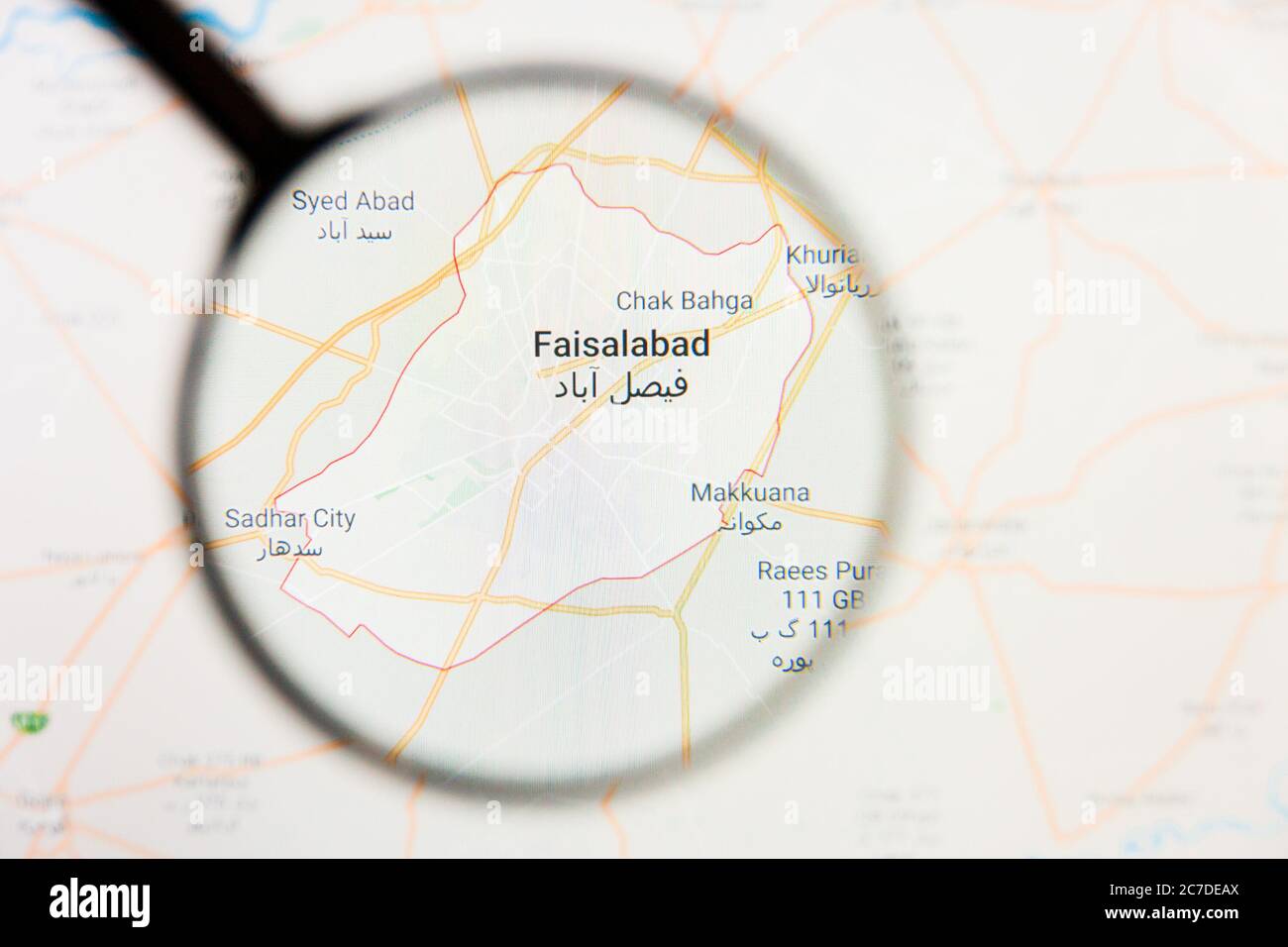 Faisalabad, Pakistan city visualization illustrative concept on display screen through magnifying glass Stock Photo