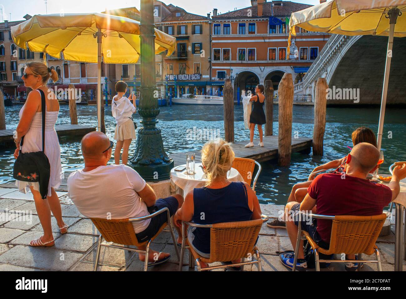 Rialto bridge. Tourists, on the Grand Canal, next to the Fondamenta del Vin, Venice, UNESCO, Veneto, Italy, Europe Stock Photo