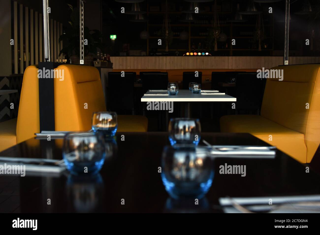 Camberley, Surrey, UK - 22 April 2020: Tables are unloved in an empty restaurant as the first Covid-19 lockdown continues in the UK Stock Photo