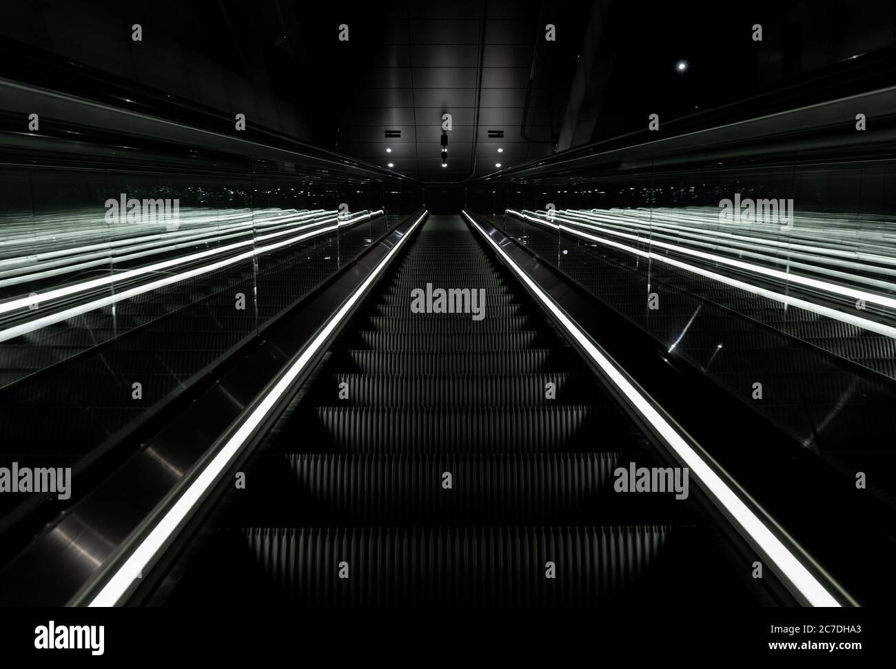 Low angle shot of an escalator going up in a metro station in Vijzelgracht, Netherlands Stock Photo