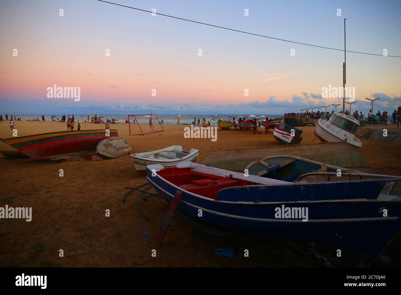 Traditional wooden boats on the beach at sunset, Santa Maria, Sal Island Stock Photo