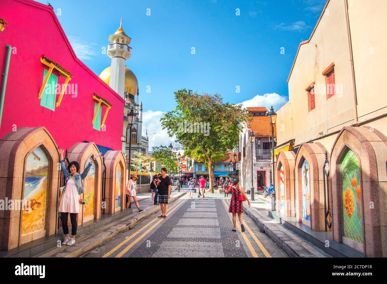 tourists walking in the famous colourful streets of Sultan Mosque (Masjid Sultan)  area,kampong glam,Singapore,asia,PRADEEP SUBRAMANIAN Stock Photo