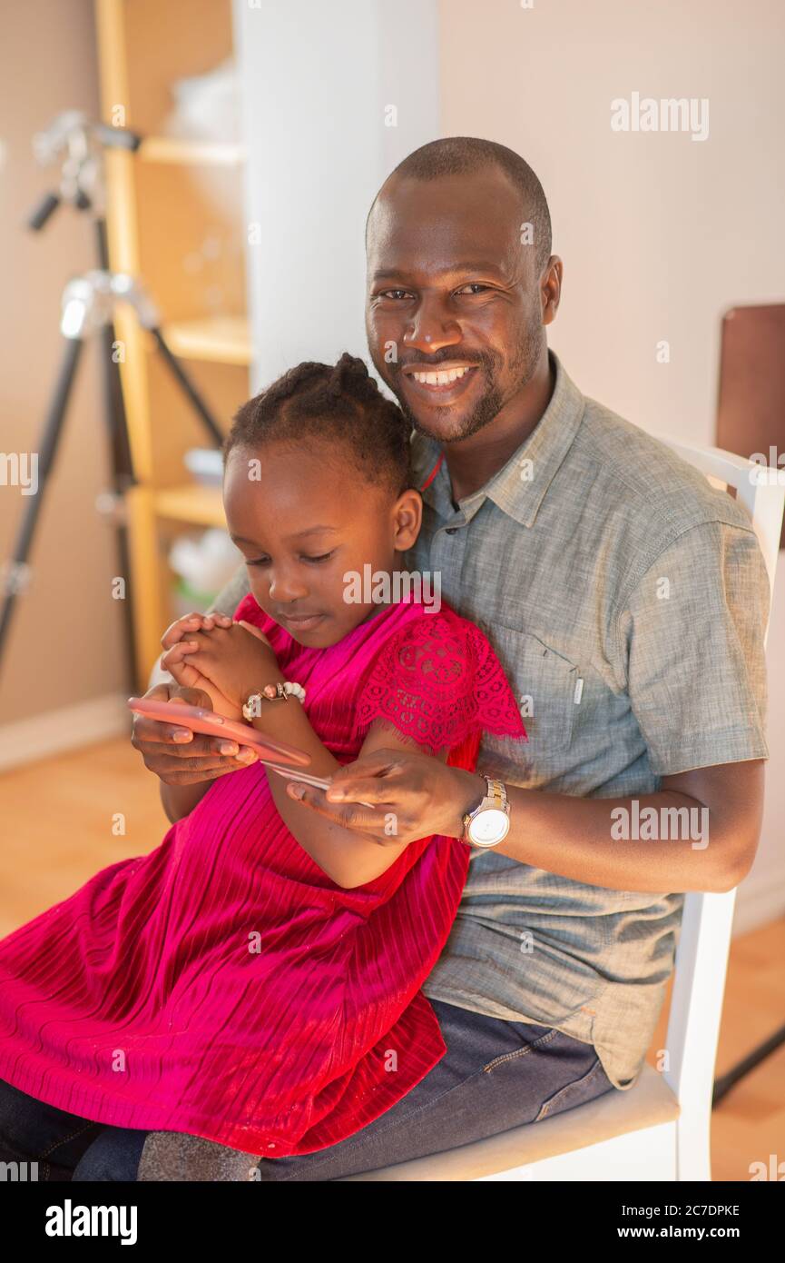 Portrait of Congolese refugees, father and daughter. Stock Photo