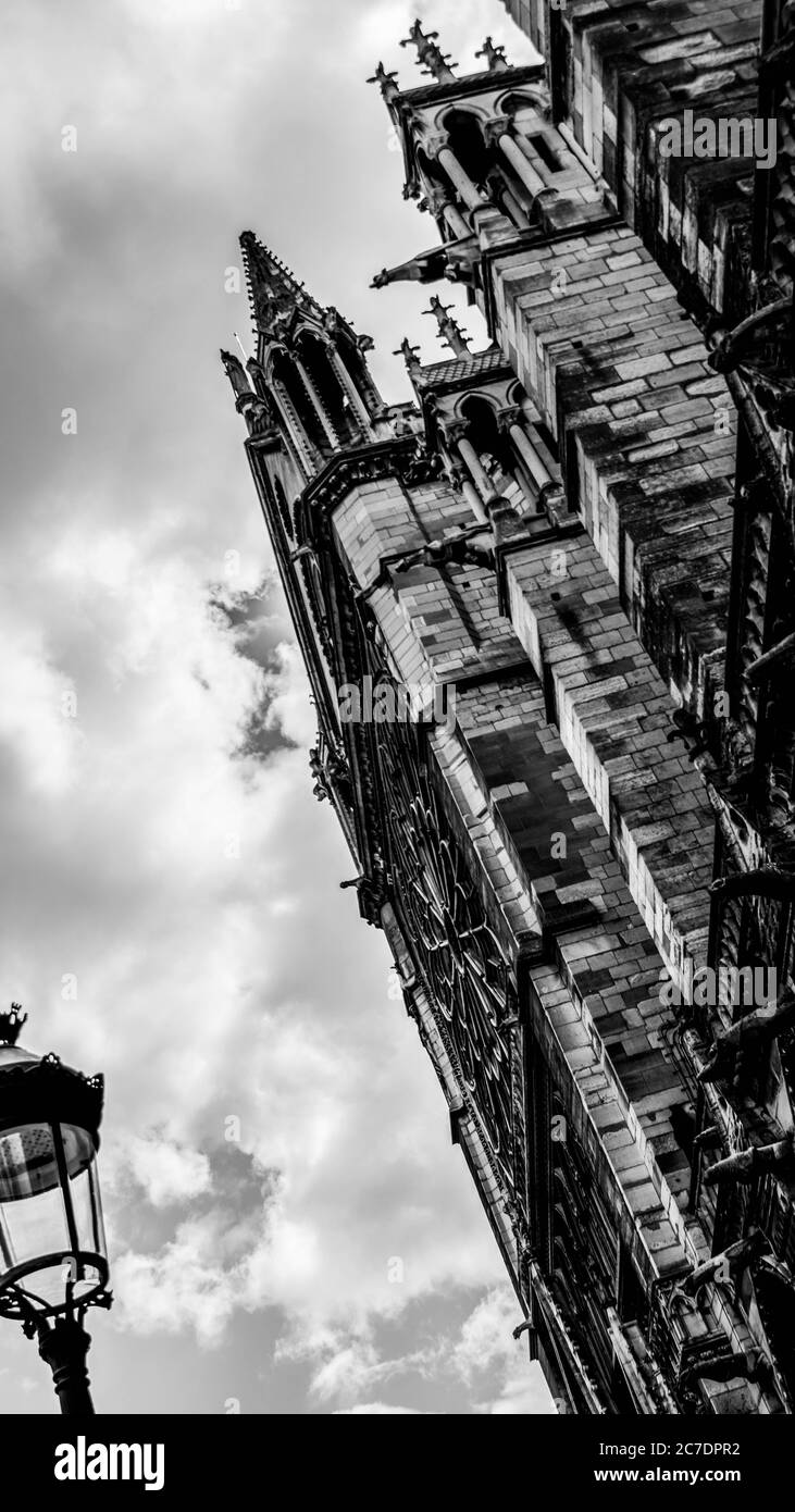 Vertical grayscale low angle shot of the Notre Dame de Paris Stock ...