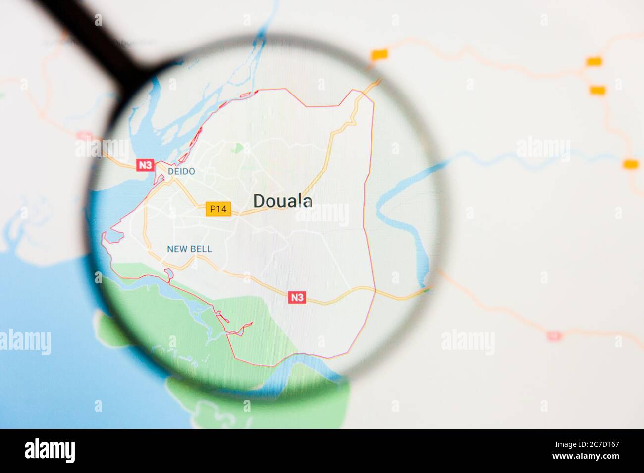 Douala, Cameroon city visualization illustrative concept on display screen through magnifying glass Stock Photo