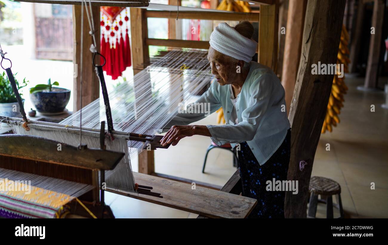 Jiangcheng, China. 15th July, 2020. The 90 years old woman is the inheritor of traditional Dai embroidery in Jiangcheng, Yunnan, China on 15th July, 2020.(Photo by TPG/cnsphotos) (Photo by Top Photo/Sipa USA) Credit: Sipa USA/Alamy Live News Stock Photo