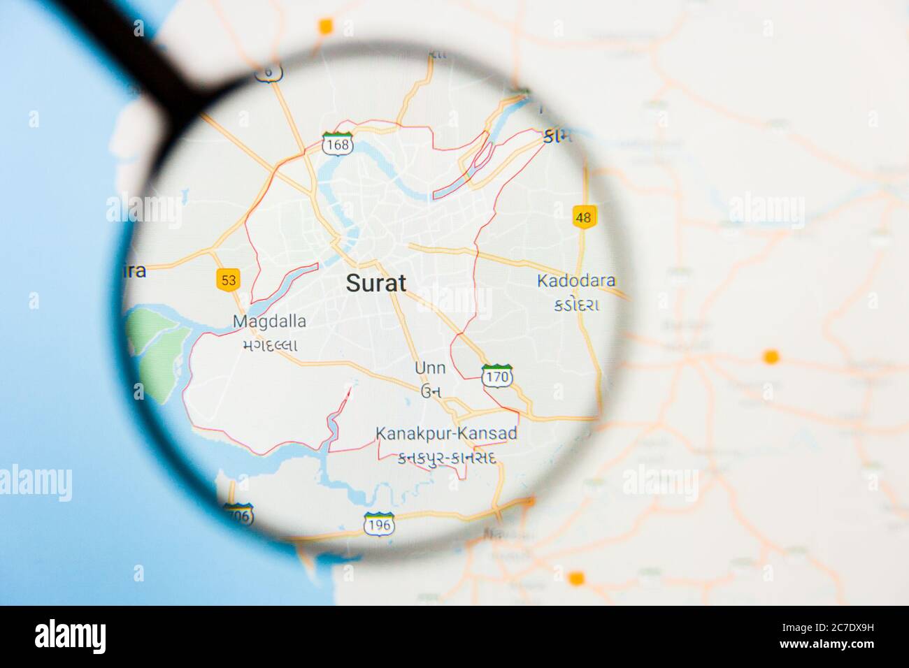 Surat city visualization illustrative concept on display screen through magnifying glass Stock Photo
