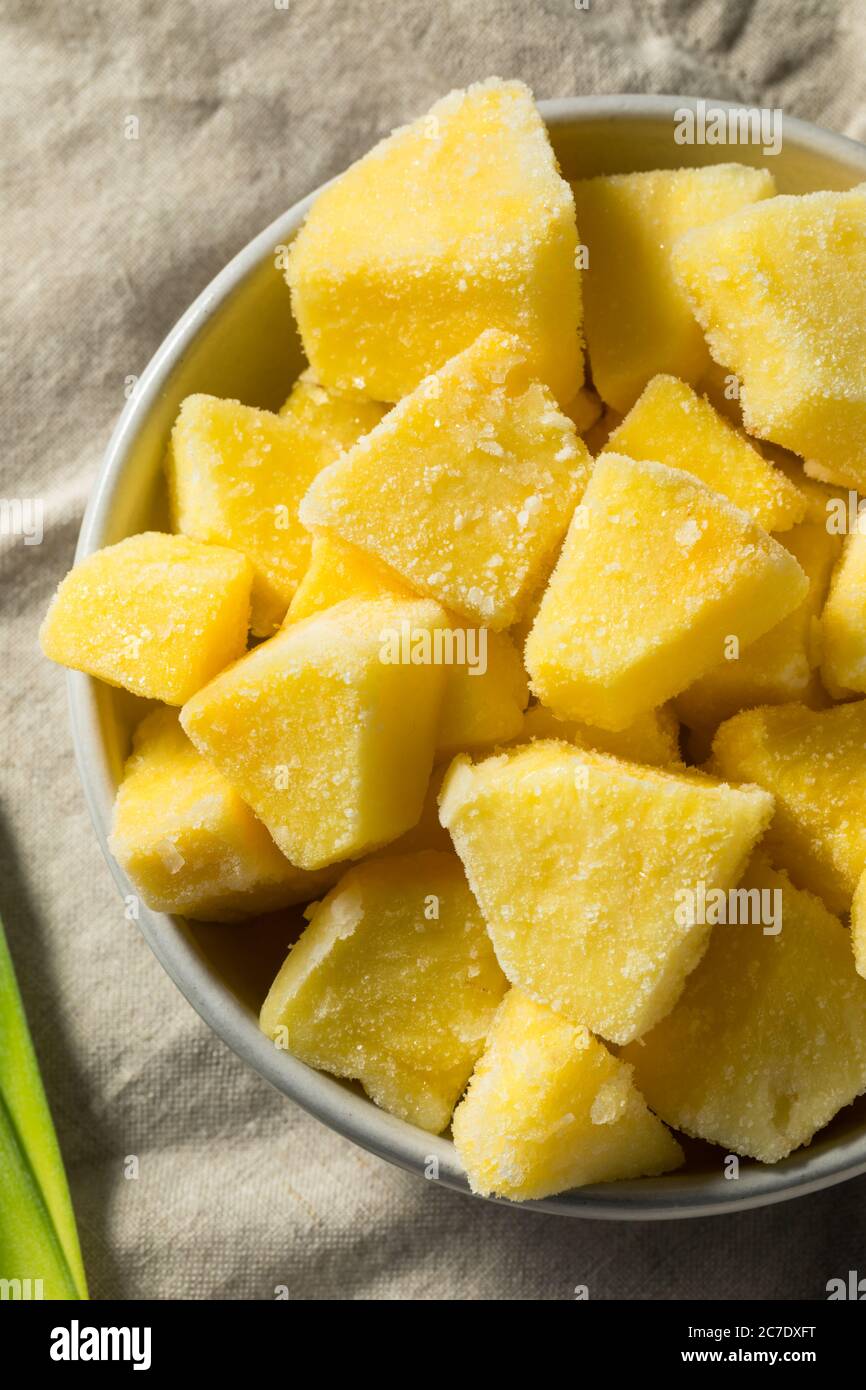 Yellow Organic Frozen Pineapple Slices to Eat Stock Photo - Alamy