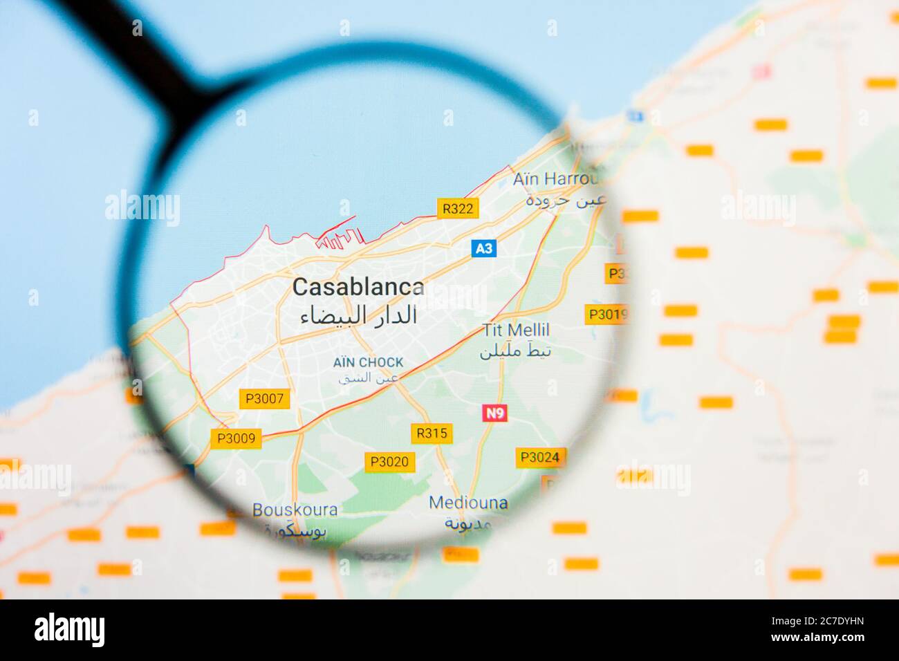 Casablanca, Morroco city visualization illustrative concept on display screen through magnifying glass Stock Photo