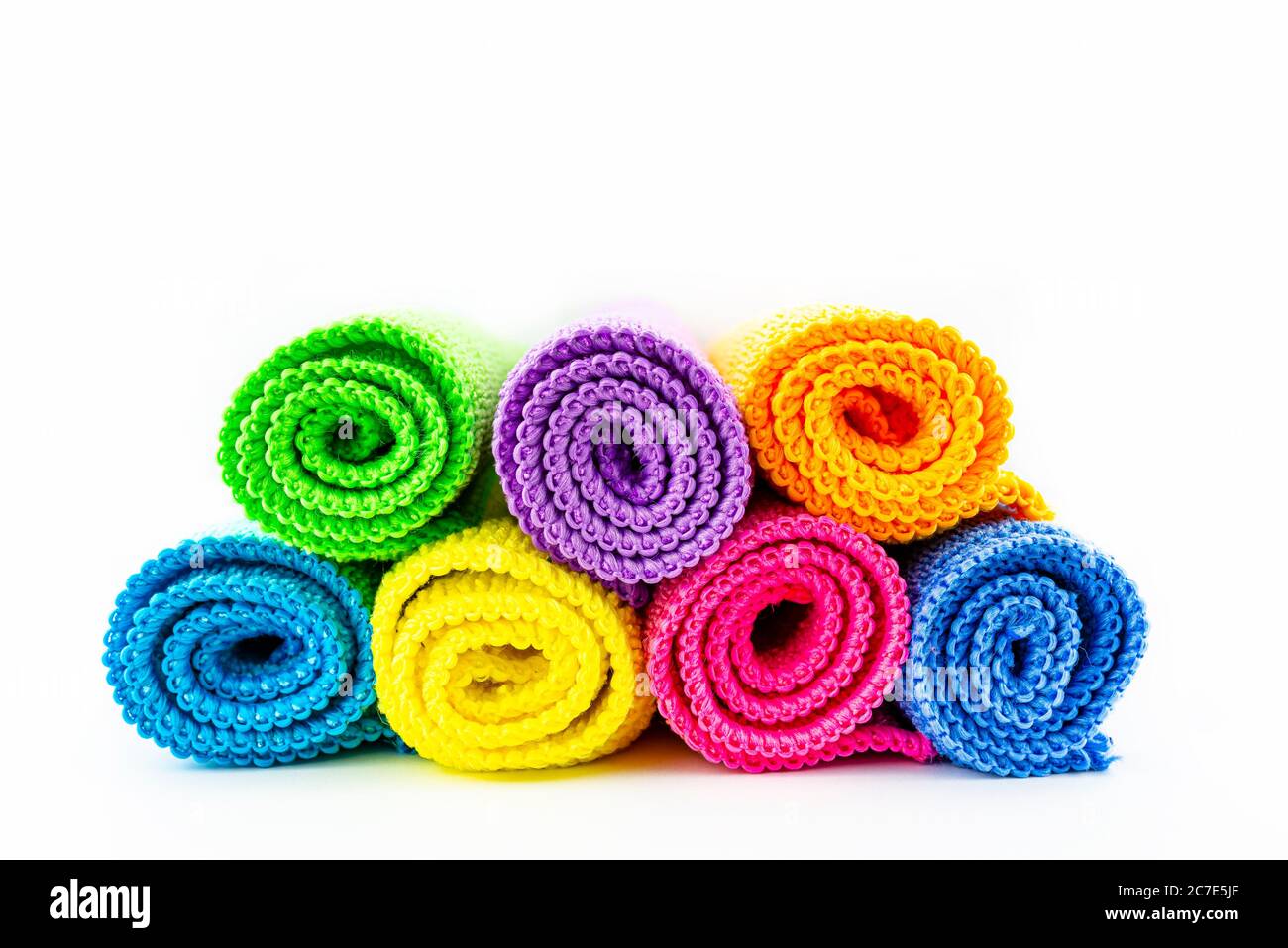 Background made of different colors of microfiber material, rolled up