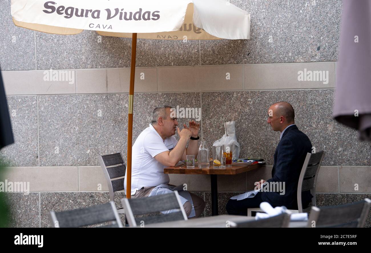 Washington, United States. 16th July, 2020. People eat outdoors at a restaurant in Washington, DC on Thursday, July 16, 2020. Rising COVID cases have stalled DC's plans to return full service setting to local area restaurants. Photo by Kevin Dietsch/UPI Credit: UPI/Alamy Live News Stock Photo