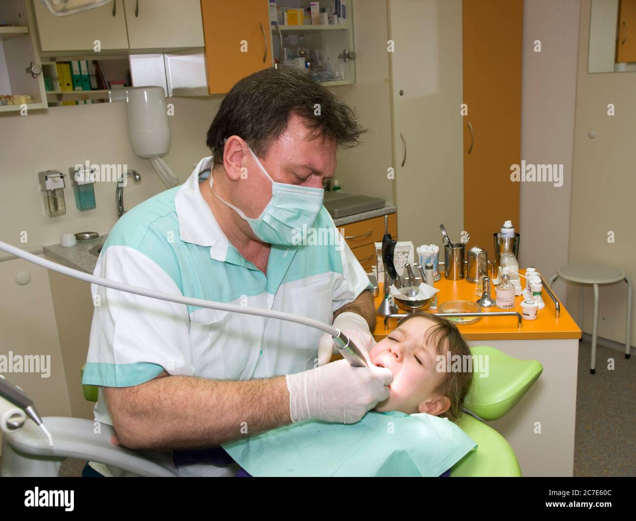 Dentist making prevention examination to little girl Stock Photo Alamy