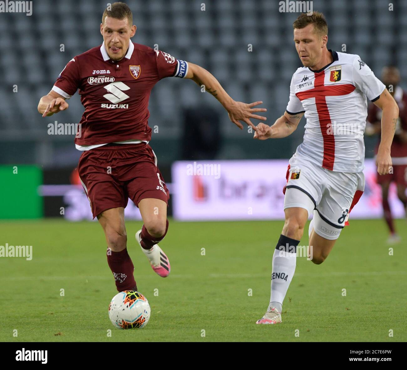 16th July 2020; Olympic Grande Torino Stadium, Turin, Piedmont, Italy; Serie A Football, Torino versus Genoa; Andrea Belotti of Torino FC shields the ball from Lukas Lerager of Genoa FC Credit: Action Plus Sports Images/Alamy Live News Stock Photo
