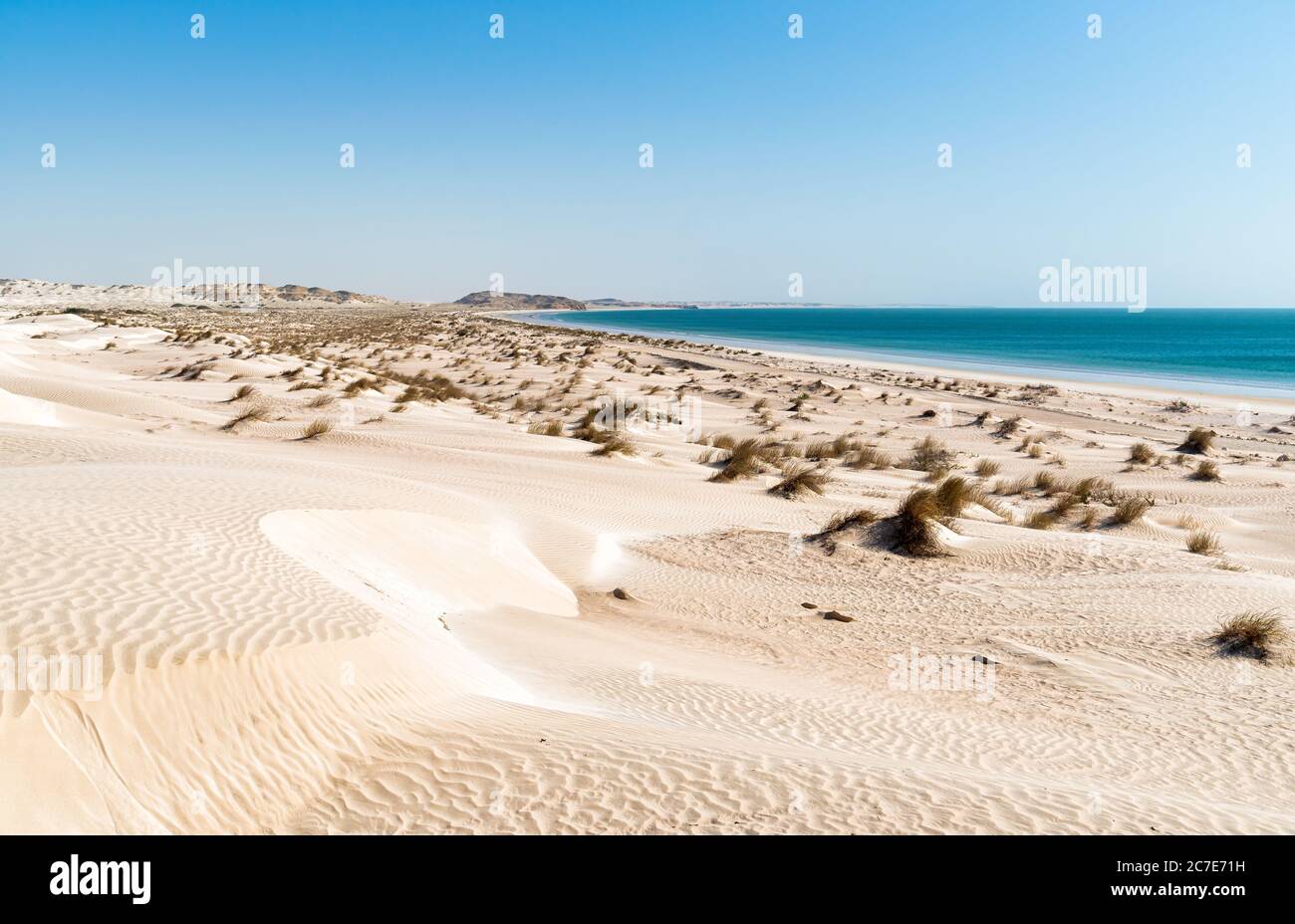 Landscape of Al Khaluf beach with dunes and white sands in the Arabian