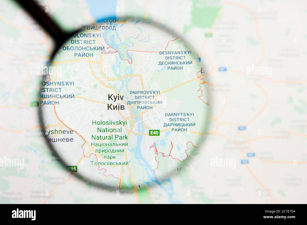 Kiev, Ukraine city visualization illustrative concept on display screen through magnifying glass Stock Photo