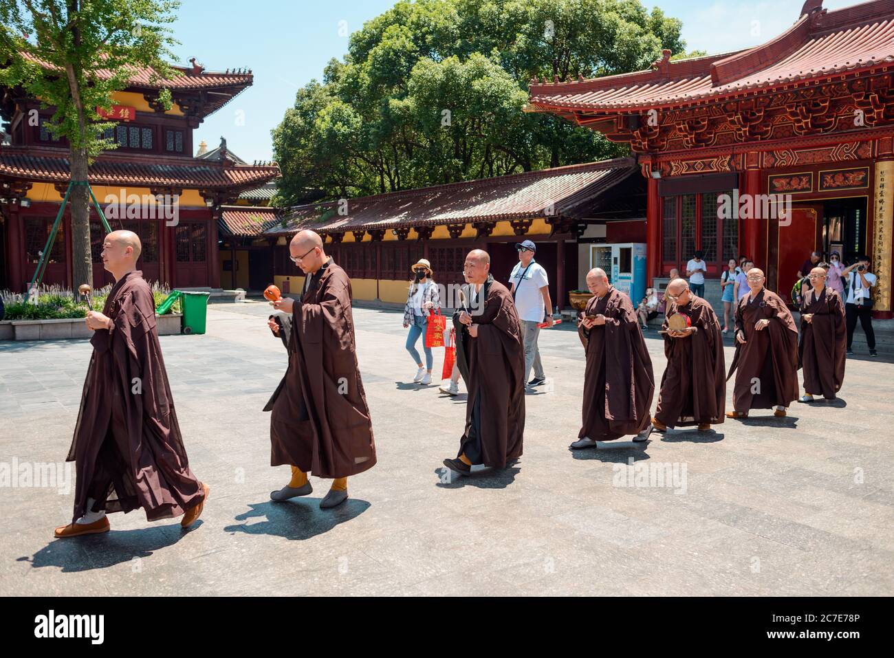 Row of Buddhist monks. Religious procession at a temple in China Stock ...