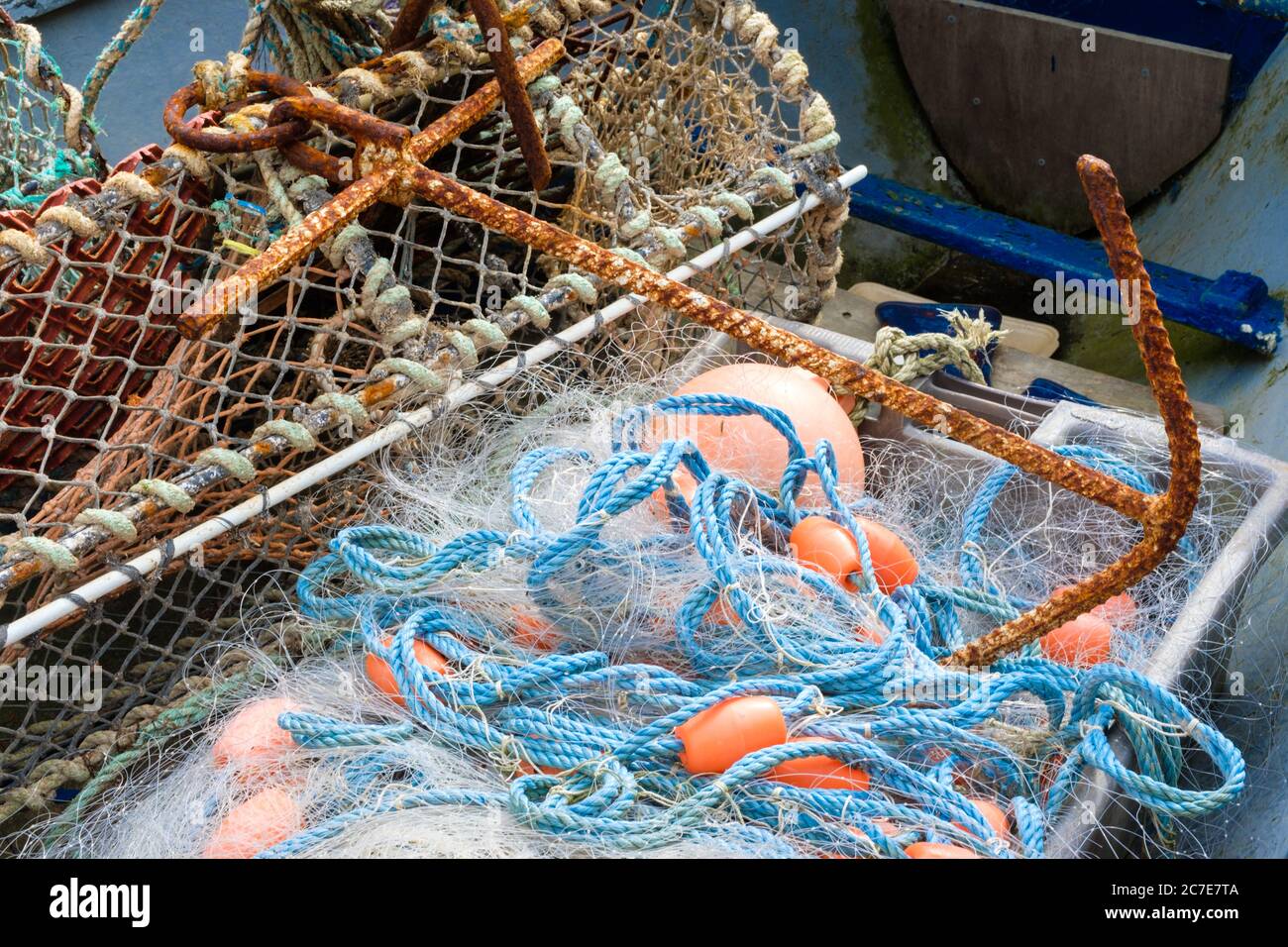 Fishing nets and tackle including lobster and crab pot, laying in a