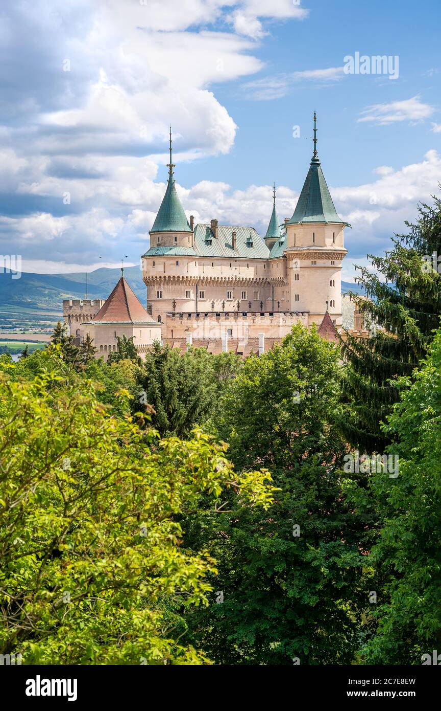 View of neogothic Bojnice castle over treetops of Castle park (Bojnice, Slovakia) Stock Photo