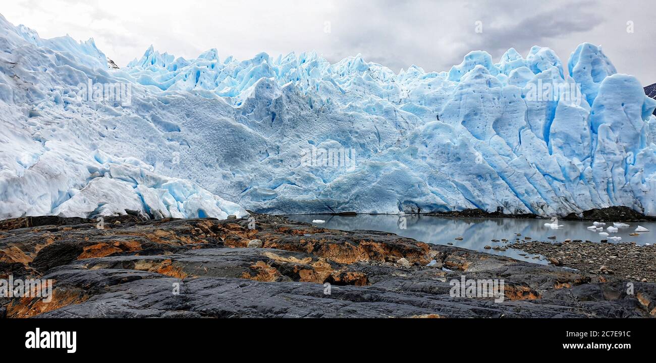 Perito Moreno glacier reflecting in the water below Stock Photo