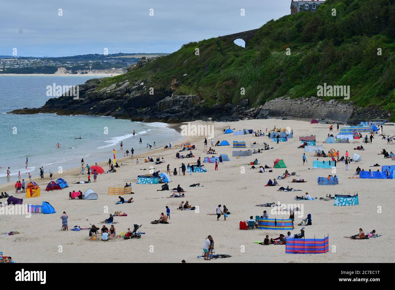 Cornwall, UK. 16th July, 2020. 16th July 2020.Lazy afternoon on a Packed beach in, Carbis Bay, Cornwall on a hot afternoon. Picture Credit: Robert Timoney/Alamy Live News Stock Photo