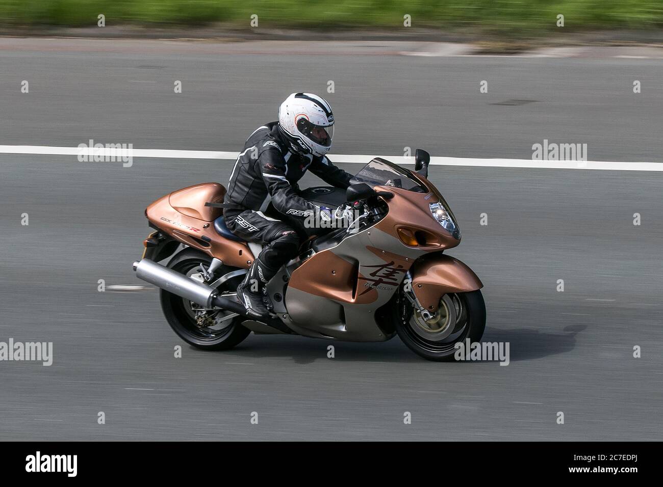 Suzuki Hayabusa Motorbike rider; two wheeled transport, motorcycles, vehicle, roads, motorbikes, bike riders motoring in Chorley, UK Stock Photo