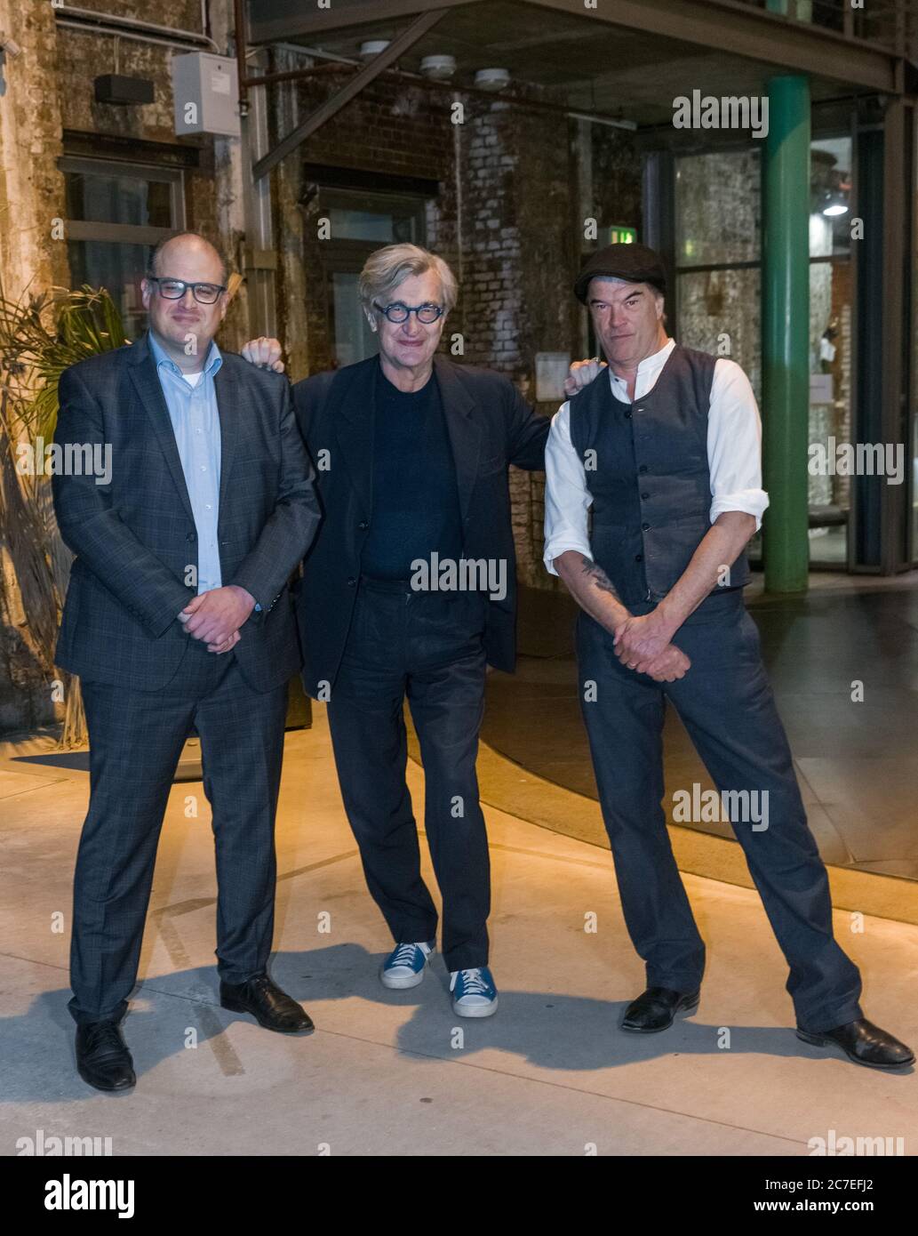 Hamburg, Germany. 16th July, 2020. The film directors Eric Friedler (l-r), Wim Wenders and Andreas 'Campino' Frege are together on the occasion of the Hamburg premiere of the film Desperado at Zeise Kinos. The two directors were given the exclusive opportunity to accompany Wenders through his everyday life as an artist and to make portraits. Credit: Markus Scholz/dpa/Alamy Live News Stock Photo